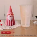 Macro-opname van Kerstman siliconen mal en roze kaars met afmetingen en fijne textuur - Kerstman E