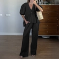 Women's casual two-piece set in black featuring V-neck puff sleeve top and wide-leg trousers - S / Black