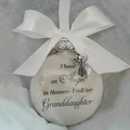 Memorial Christmas ball ornament for granddaughter with white ribbon and angel charm - Granddaughter