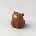 Handcrafted brown wooden bear figurine with detailed carved texture on white background - Brown Wood Carved Bear
