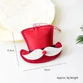 Red felt Christmas hat ornament with white stitching and hanging rope for tree decor - Beard Santa Hat