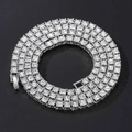 Detailed macro view of silver tennis chain with brilliant stones and secure clasp closure - 40 cm / Silver White 4mm