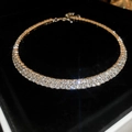 Macro shot of French luxury style double-row rhinestone choker necklace on black velvet - Silver-Double Row