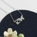 Polished stainless steel letter D necklace with butterfly accent and silver cable chain - Silver D