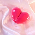 Two heart-shaped pink beauty sponges inside a clear heart box on pink silk fabric - Rose Red Heart/OPP Bag