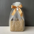 Detail of woven gift basket with white mesh wrap and gold ribbon bow for weddings - Antique Gold Full Wrap Snow Mesh