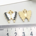 Macro detail of alloy butterfly charm with scale ruler showing 22mm width and 20mm height - 1Pc Black & White Drip Oil Butterfly / 17*18mm