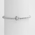 Silver beaded elastic bracelet featuring a 3D letter E charm in a polished finish - Silver E