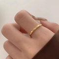 Minimalist V-shaped water ripple ring in gold titanium steel with small center diamond - Water Ripple Thin Zirconia Inlaid Gold