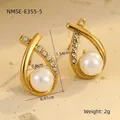 Detailed view of French-style gold drop earrings with white pearls and small zircons - 18K Gold / Gold Cross Pearl Stud Earrings