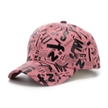 Close-up of pink baseball cap with black newspaper print and street style lettering - One Size(Adjustable 56-60cm) / Watermelon red