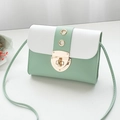 Minimalist mint green and white crossbody bag with gold metal buckle and leather texture - Green
