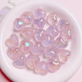 Macro shot of iridescent purple heart-shaped resin beads for DIY jewelry crafts - 1 Bead / Light Purple