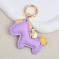 Purple leather horse keychain with yellow mane and golden lucky bag charm - Large / Purple
