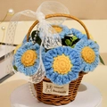 Detail of handmade crochet blue flowers in a vine basket with lace bow and pearls - 7 Blue Daisies Basket