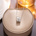 Silver double ring necklace with sparkling diamonds on a golden display stand - 814 Combination Waist Style (814) / Silver
