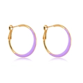 Macro shot of gold hoop earrings with purple enamel coating and S925 silver stamp details - Simple Purple Enamel Hoops