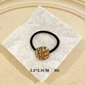 Gothic geometric hair tie with textured gold round charm on black elastic band - Small Round