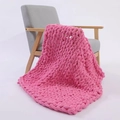 Pink chunky knit chenille blanket draped over a grey wooden chair on white background - 25*100cm / Sunset Pink