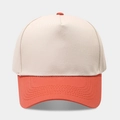 Close-up of five-panel baseball cap with beige crown and orange brim featuring stitching - Beige/Orange