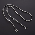 Detail of silver beaded crossbody chain with clear acrylic charms and round spring clasps - Silver Diamond Beads (K1565)