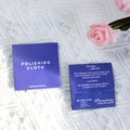 Detail of blue jewelry polishing cloth packaging showing usage instructions and functions - 5x5cm / Purple Blue