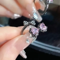 Gothic style black bow ring with pink heart gemstones and crystal star accents - Black Double Pink Heart Bowknot
