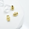 Three gold-plated vintage style vase spacer beads with intricate embossed texture for DIY jewelry - 5.3*7mm / Gold