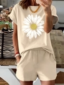 Dettaglio della stampa a girasole su set casual da donna in maglia di cotone beige - Taglia S / Albicocca