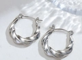 Elegant silver irregular twisted hoop earrings with a polished metallic geometric finish - Silver Style K7-100