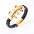 Bracciale minimalista in pelle intrecciata nera con dettaglio chiodo in acciaio dorato - Oro
