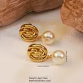Golden stainless steel twisted knot earrings with hanging white round pearls - Stainless Steel Pearl Knot Dangle