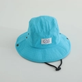 Detail of blue quick-dry kids bucket hat featuring a white GO patch and chin strap - 52cm / Sky Blue