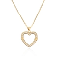 Detailed view of gold-plated heart pendant with micro-set zircons on a delicate chain - Hollow Rhinestone Heart Pendant
