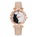 Close-up of cat silhouette dial and sparkling rhinestone-studded bezel of the quartz watch - Beige Single Watch