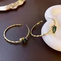 Gold C-shaped bamboo texture hoop earrings with green water-drop gemstone pendants - Green Bamboo C-Shape (10#)
