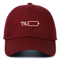 Close-up of 1% low battery embroidery on a burgundy cotton baseball cap detail - Adjustable / Burgundy
