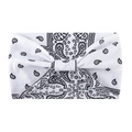 Bohemian wide knotted headband featuring a classic black and white paisley print design - White Paisley