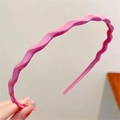 Pink wavy candy-colored headband for women made of smooth plastic in a sweet minimalist style - Rose Red