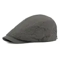 Dark grey flat cap featuring textured seersucker fabric and a metal logo plaque - Adjustable / Dark Gray