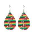 Close-up of teardrop faux leather earrings featuring festive Santa and reindeer patterns - Colorful Stripes Santa Claus