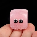 Pink rose quartz carved monster skull cube with black bead eyes and engraved teeth detail - Rose Quartz