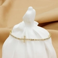 Elegant gold titanium steel bracelet with a cross pendant and sparkling cubic zirconia - Bracelet No. 10 (B0055)