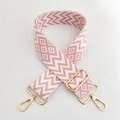 Detail of pink and white wave pattern woven strap with gold metal hooks for bags - Pink