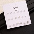 9-piece silver earring set with heart, star and pearl shapes on white display card - Silver Heart Starfish Pearl Earrings (E0214-1)