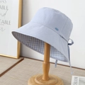 Light blue bucket hat with plaid lining and a decorative bow tie on the back - M (56-58cm) / Double Sided Blue