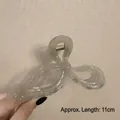 Translucent grey butterfly hair claw clip with bow design in a large 11cm size - Glossy Bow Grey-11cm