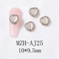 Detailed macro view of 10x9.5mm heart shaped opal nail art charms with golden diamond borders - Gold Base White Opal (AJ25)
