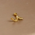 Detailed view of S-shaped gold wave stud earring with pavé-set cubic zirconia crystals - S-shape Wave / Gold