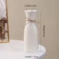 White minimalist ceramic vase with wavy rim and hemp rope bow decor, 21cm height - Glazed Zhiruo (21cm)